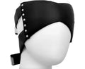 Black blindfold with rivet embellishments on a mannequin head against a white background