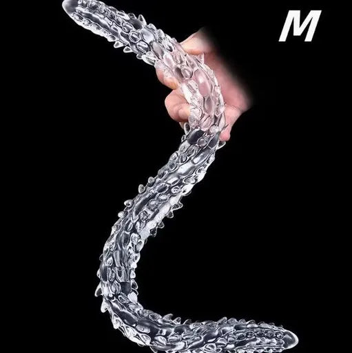 Clear long textured snake on a black background
