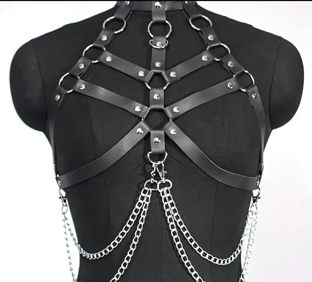 Black leather harness with chain details on a mannequin