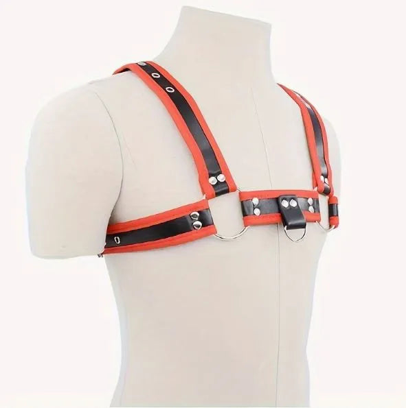 Black and red chest harness with D-rings shown on a mannequin torso, styled for submissive or pup play use.